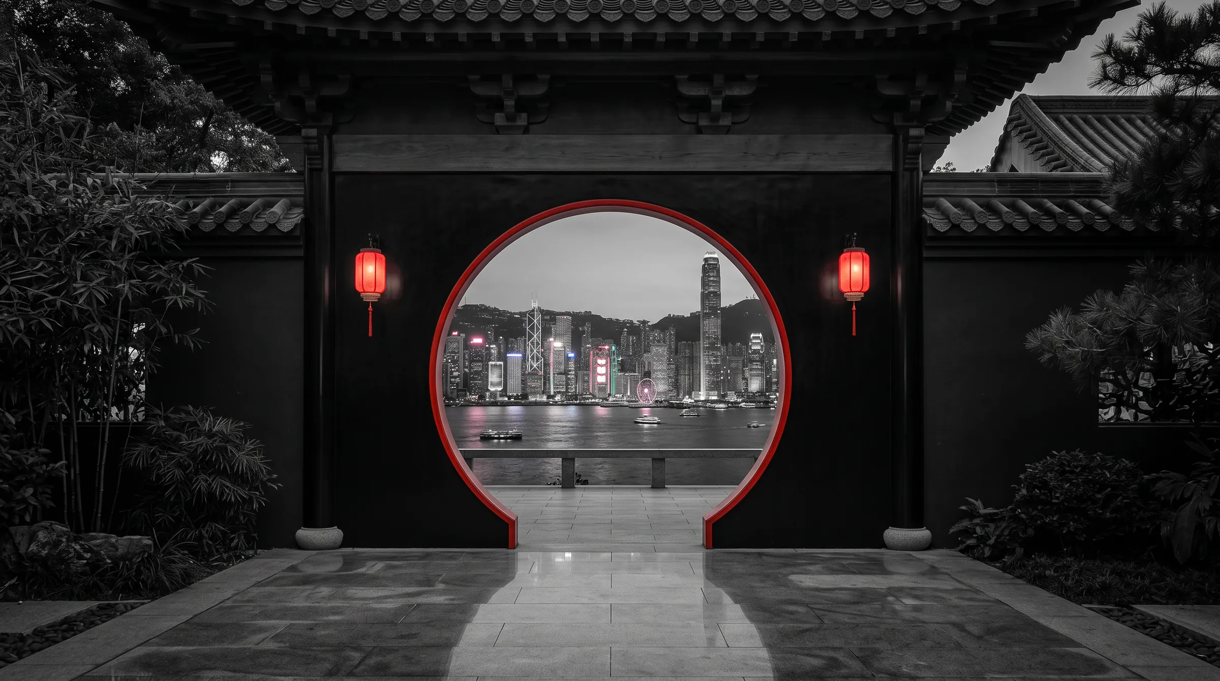A red-rimmed moon gate framing the Hong Kong skyline